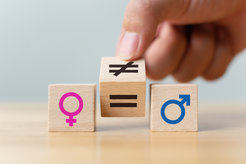 Dices showing the symbols of female and male sex